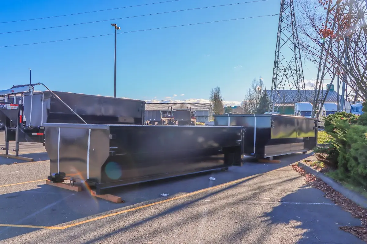 Roll-off dumpster ready for waste disposal at job site for 10 Yard Dumpster Rental in Compton